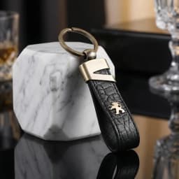 جایسوئیچی چرم و طلا طرح پژو K004